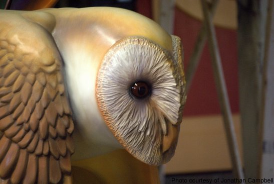 William Rogers finishes carousel owl with hand painted detail